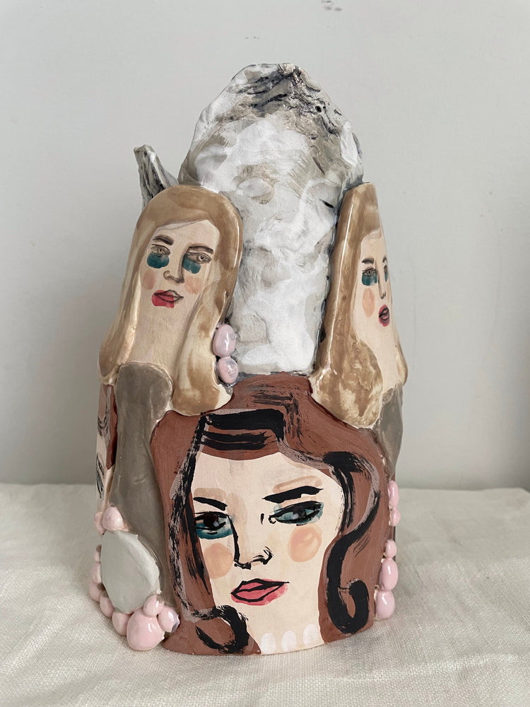 Heads With Oyster Shells