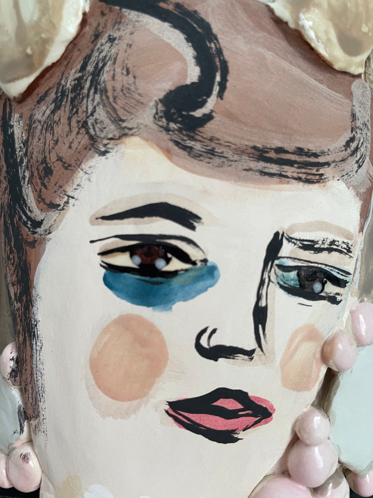 Heads With Oyster Shells